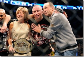 Nov 17, 2012; Montreal, QC, Canada;  Georges St-Pierre poses for a photo with his parents Pauline and Roland after winning the Welterweight Championship bout against Carlos Condit at UFC 154 at the Bell Centre.  St-Pierre defeated Condit by unanimous decision.  Mandatory Credit: Eric Bolte-US PRESSWIRE